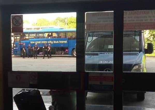 Coach being searched by police at Preston bus station.