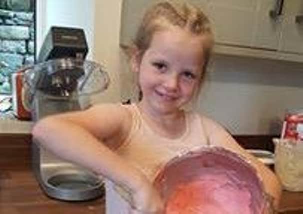 Grace Smith, 7, from Higher Wheelton, is baking cakes for her tea part to support Macmillan Cancer Support.