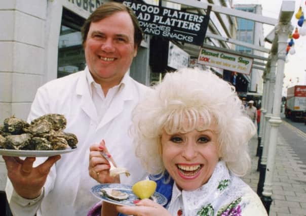 memory lane june 11

seaside stars

Barbara Windsor outside Robert's Oyster Bar on Blackpool Promenade in 1992