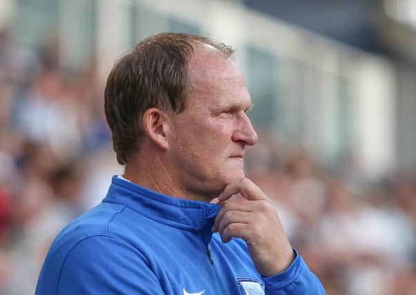 Simon Grayson will be working on the best way to get North Ends league season up and running at Loftus Road