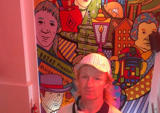 Terrence Ashcroft with the mural at Solita, Preston. He was once dubbed Toxic Terry but has turned his life around