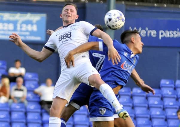 Alan Browne battles for the ball in PNE's friendly against Oldham.