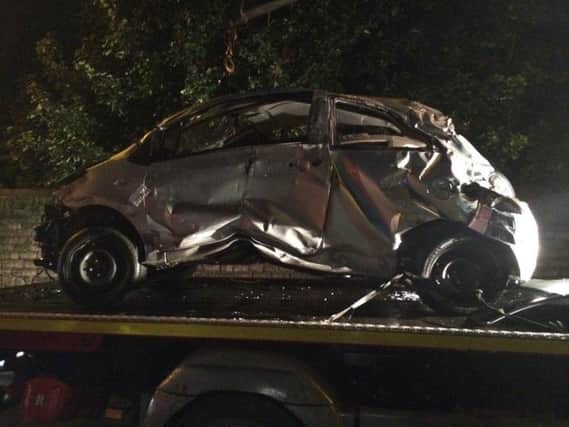 Crash: The wreckage of a car after a collision in Wigan Road PICTURE: Lancs Road police