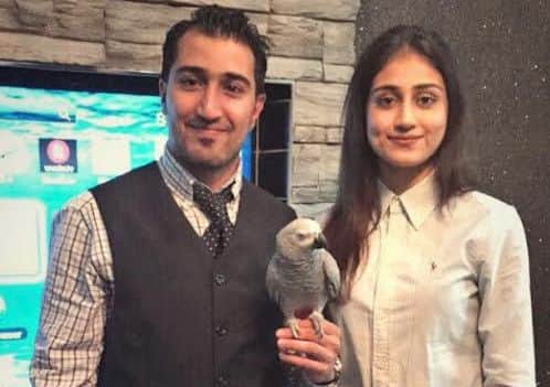 A Chorley family is thanking thousands of people who helped their campaign to find their lost parrot, Rosie in Chorley.Pictured: Brother and sister Shoaib and Fatima and their parrot Rosie.