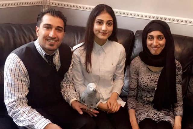 A Chorley family is thanking thousands of people who helped their campaign to find their lost parrot, Rosie in Chorley.
Pictured: Brother Shoaib and sisters Fatima and Sabiha with their parrot Rosie.