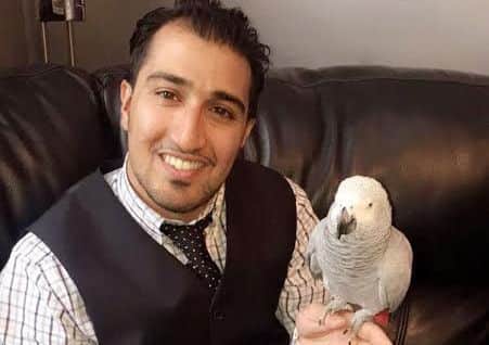 A Chorley family is thanking thousands of people who helped their campaign to find their lost parrot, Rosie in Chorley.Pictured: Owner Shoaib with parrot Rosie.