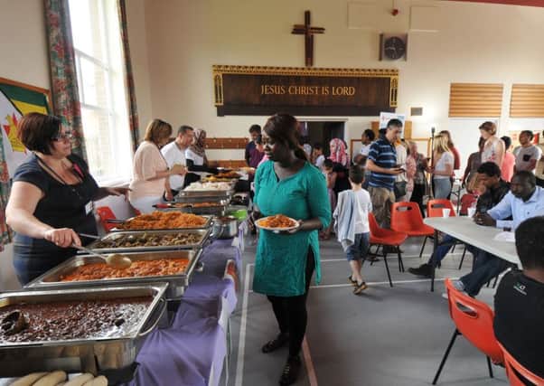 An event organised by the Red Cross for refugees from around the world, currently in Preston, where people could share food from their home countries