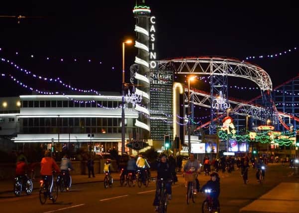 Cyclists ride the lights last year