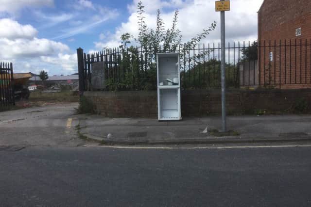 A fridge dumped on Cemetery Road, Preston