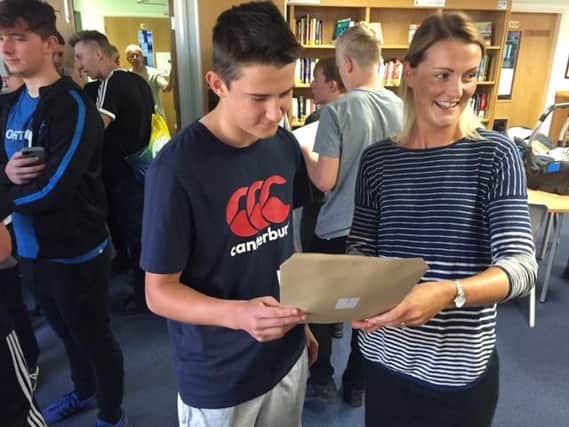 Hutton Grammar: Sam Steeple 12 passes inc 5A* and 5As with KS4 Learning Coordinator Mrs Hill
