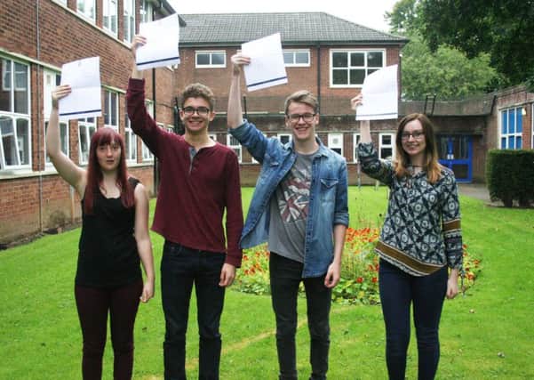 Celebrating their GCSE success, pupils at Albany Academy 
GCSE results 2016