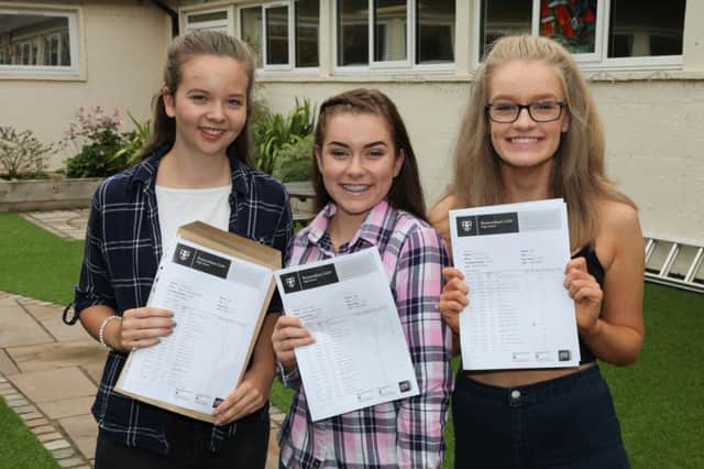 Penwortham Girls' High School pupils from left  Abigail Rushton, Melissa Gore, Emily Gray with their GCSE results