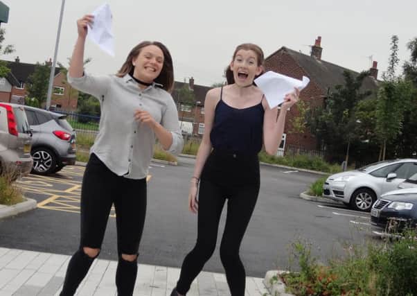Great results: Pupils at Leyland St Marys are jumping for joy after collecting their first class GCSE results