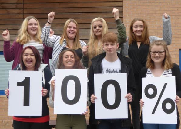 Pupils celebrate 100 per cent success