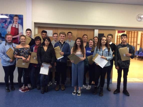 Longridge High School pupils with their GCSE results