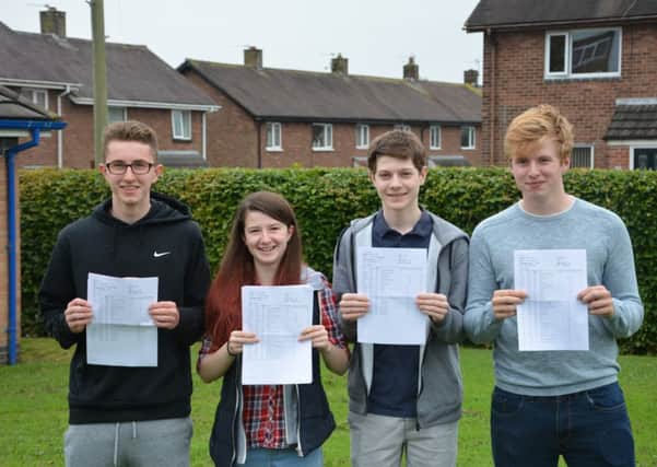 Top performers L-R William Martin (10 A*, two As), Sarah Royal (11 A*s, one A and one B), Louis Irwin (10 A*s and three As) and Owen Hall (four A*s, three As, five Bs and one C)