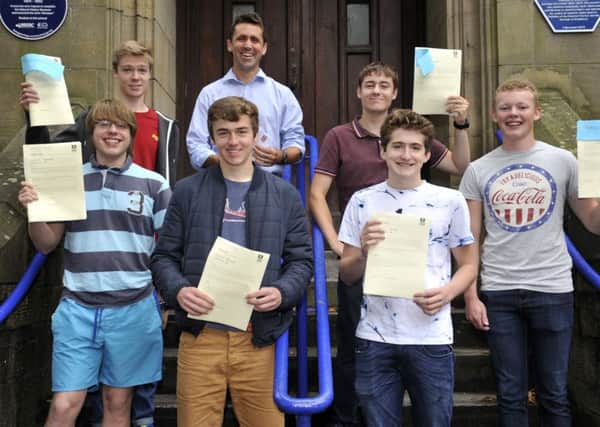 Headteacher Dr Chris Pyle with high GCSE achievers at Lancaster Royal Grammar School