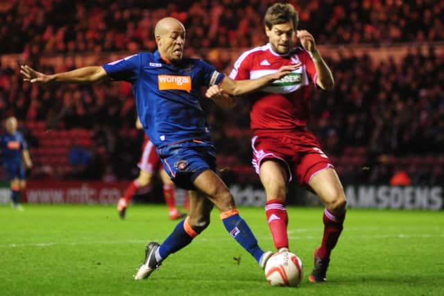 Alex Baptiste in action for Blackpool.