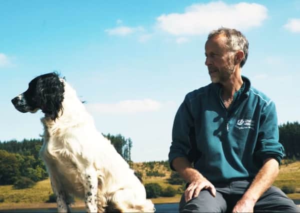 Spaniel Twist and his owner Dave Oyston. United Utilities have given Twist the role of assistant catchment controller of the Forest of Bowland in recognition of his dogged service.