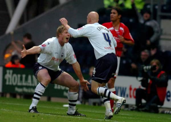 Neil Mellor and Richard Chaplow celebrate a goal against Barnsley in 2008