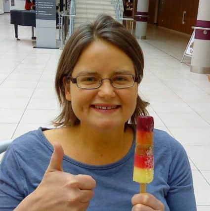 Emma Gregson, a primary school teacher who was days away from death before undergoing a lifesaviing liver transplant
Emma eating an ice lolly just before her transplant.
She is eating an ice lolly because one of her symptoms was getting very hot.