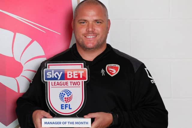 Jim Bentley with his manager of the month prize
