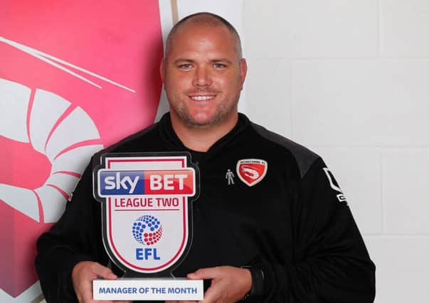 Jim Bentley with his manager of the month prize