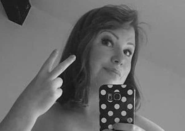 Rebecca Wilkinson from Caton posted this Facebook selfie after undergoing cancer surgery