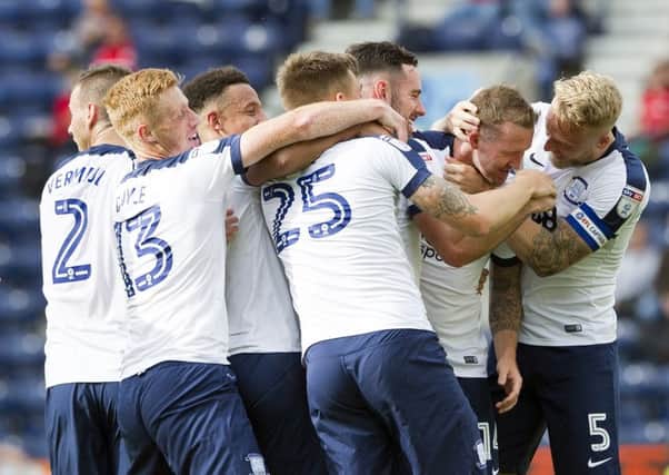 Aiden McGeady is congratulated by his North End team-mates after scoring  against Barnsley