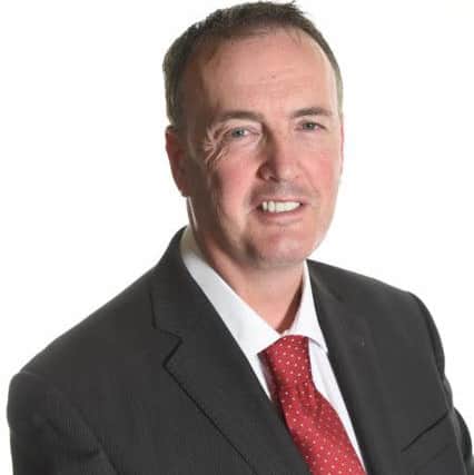 Police and Crime Commissioner Clive Grunshaw.