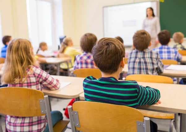 A Generic Photo of a group of school children in a classroom. See PA Feature WELLBEING Mindful Nation. Picture credit should read: PA Photo/thinkstockphotos. WARNING: This picture must only be used to accompany PA Feature WELLBEING Mindful Nation.