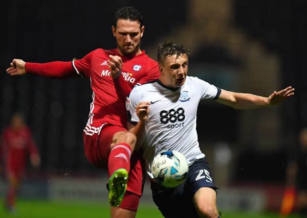 PNE striker Jordan Hugill battles with Cardiff's Sean Morrison