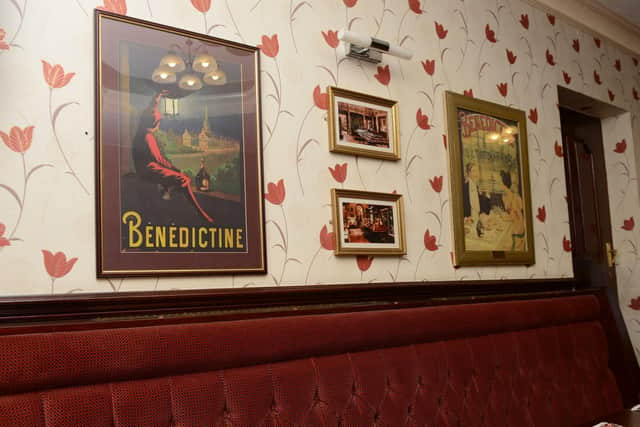 Mementoes on the wall of the Benedictine Lounge in the Burnley Miners Working Mens Social Club.