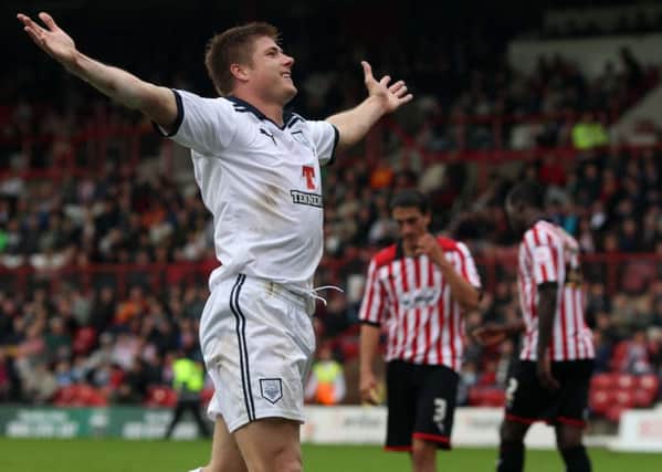 Neil Mellor celebrates his second and PNE's third goal against Brentford in 2011