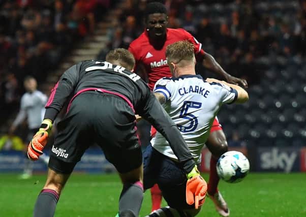 Preston North End's Tom Clarke scores against Cardiff City on Tuesday night.