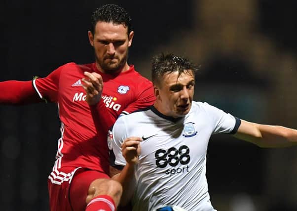 Jordan Hugill battles with Cardiff City's Sean Morrison