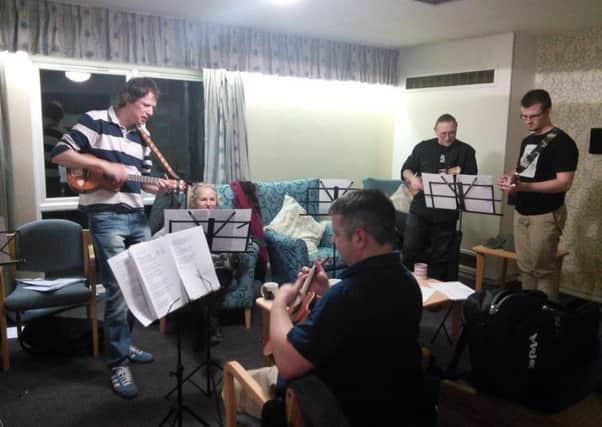 Preston Ukelele Strummers Society entertaining residents at New Brook House sheltered housing scheme in March 2016
