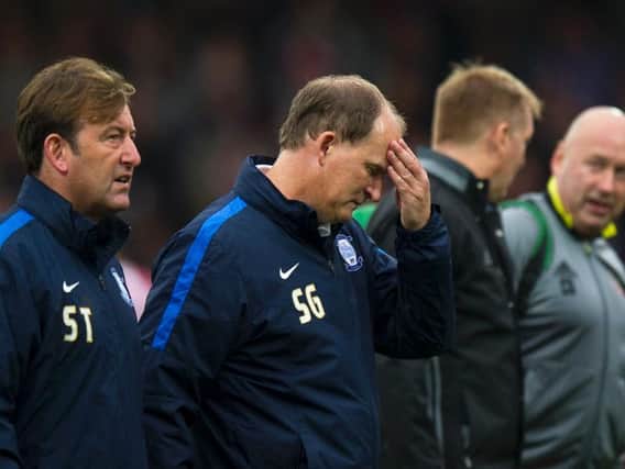 PNE boss Simon Grayson and first-team coach Steve Thompson at the final whistle at Brentford