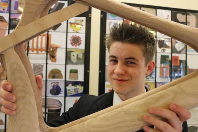 Jamie Edward with his wooden bike frame