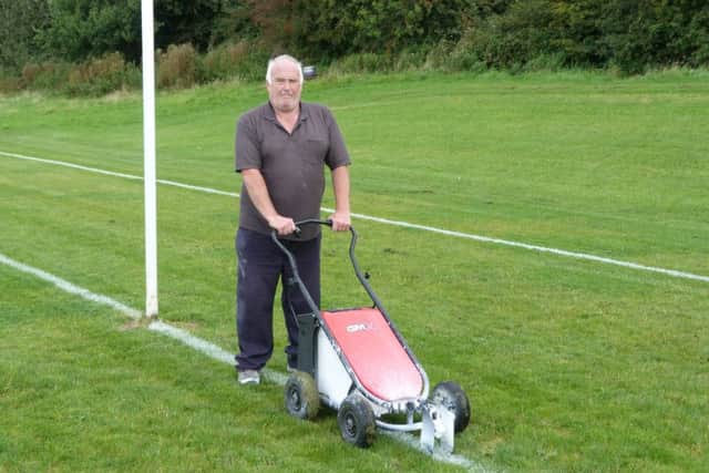 Dave Perry mowing the lawn on the Chorley Panthers pitch