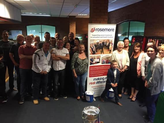 Fundraisers take part in a snooker match for Rosemere Cancer Foundation