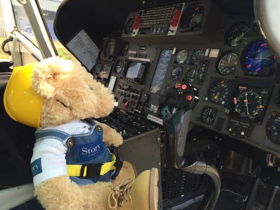 Story Homes's Builder Bear in the cockpit of an air ambulance