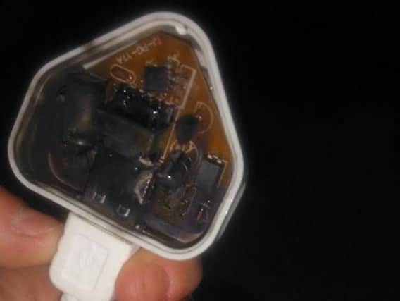 The charred plug of the lead bought to charge a Samsung S5.
