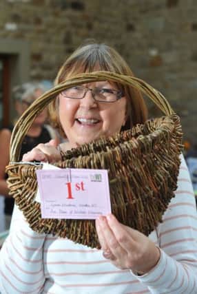 Lynne Hudson with her willow basket