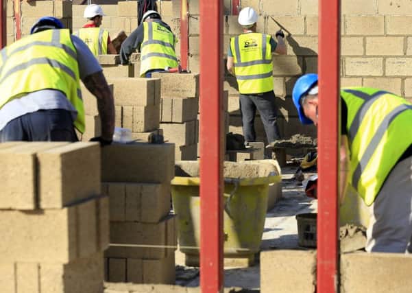 WORKING: Construction workers