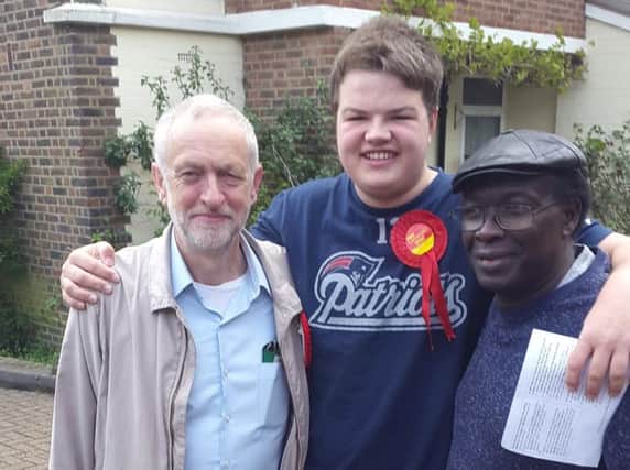 UCLan student Galileo Sutherland-West (centre) with family friend and constituency MP Jeremy Corbyn (left) and a neighbour in Islington