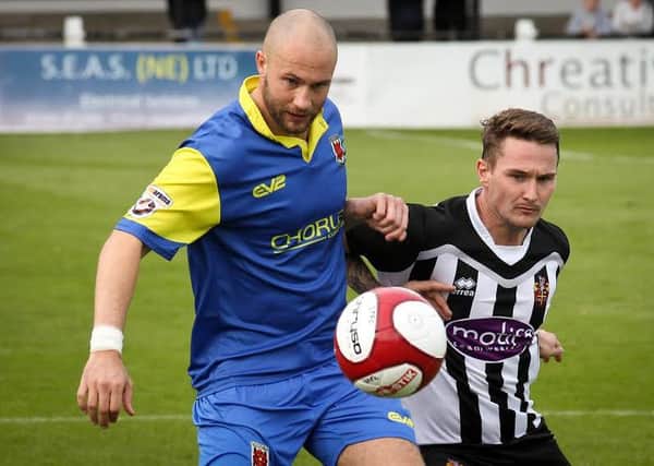 Captain Andy Teague in action against Spennymoor Town