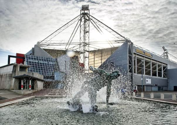 The Sir Tom Finney Splash statue at Deepdale