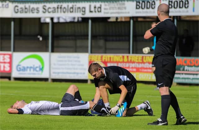 Brigs Alistair Waddecar  suffered a knee injury against Lancaster City
