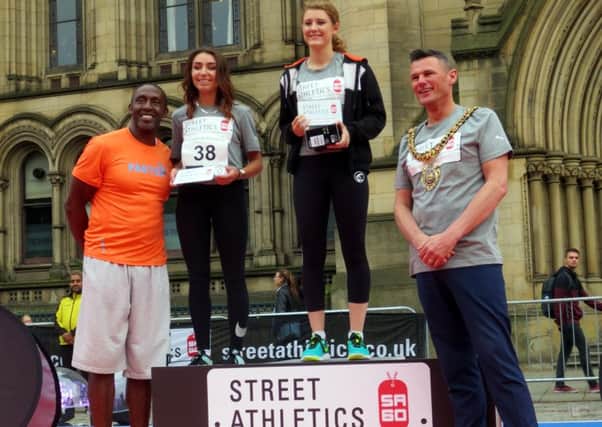 Sophie Warden is crowned champion by Linford Christie